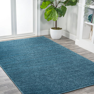 Haze Solid Low-pile Area Rug Turquoise